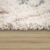 Hosszú szálú ősi motívumos szőnyeg - krém 120x170 cm