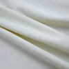  2 db krémszínű bársony sötétítőfüggöny gyűrűkkel 140 x 175 cm
