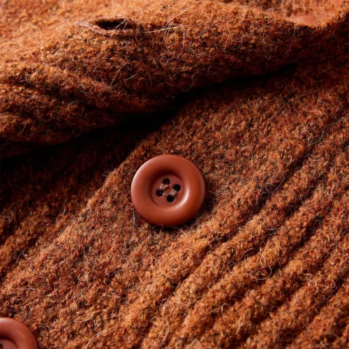 Konyak színű kötött gyerekkardigán 116