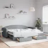  világosszürke kihúzható szövet heverő fiókokkal 90 x 200 cm