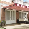  Behúzható napellenző Piros és Fehér 600 × 350 cm