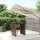  barna polyrattan kerti asztal üveglappal 105 x 80 x 110 cm