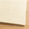  HUARTE krémszínű rövid szálú puha és mosható szőnyeg 80x150 cm