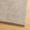  HUARTE homokszínű rövid szálú puha és mosható szőnyeg 60x110 cm