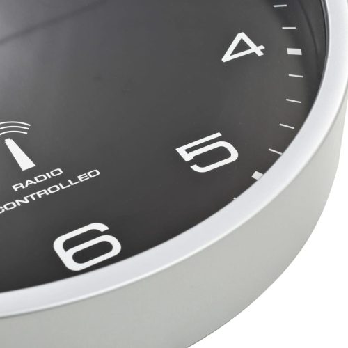  fekete színű rádióvezérelt falióra kvarcszerkezettel 31 cm