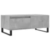  betonszürke szerelt fa dohányzóasztal 90x50x36,5 cm